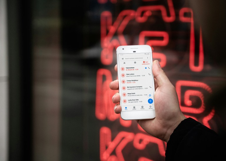 Person reading messages on phone showing scams from scammers impersonating recruitment companies in the Netherlands