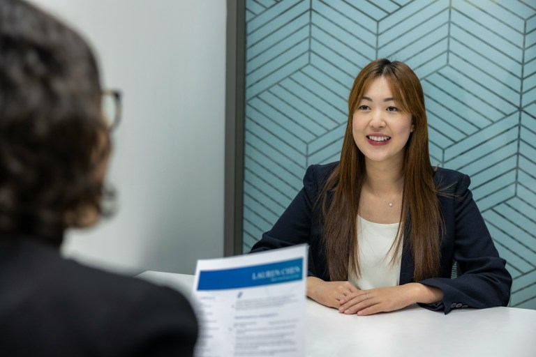 Job candidate preparing for an interview and asking the best interview questions.