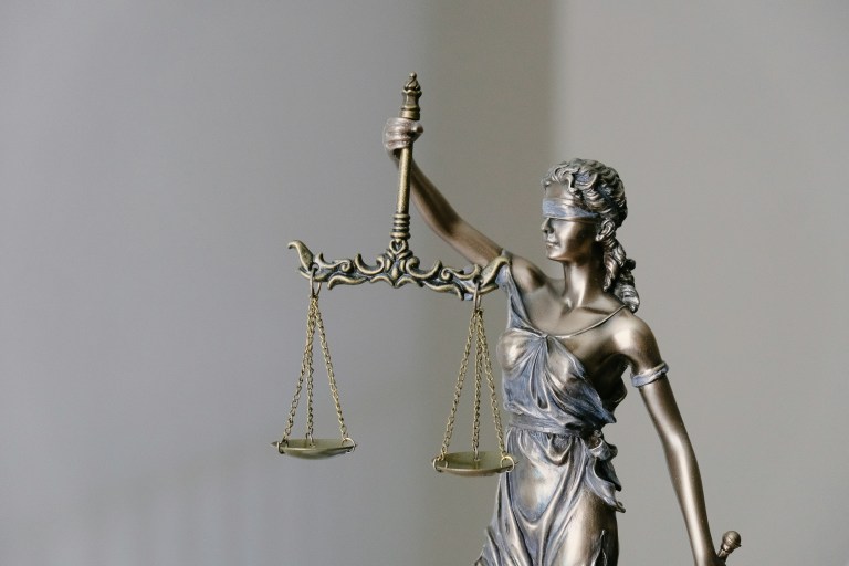 Figure of Lady Justice representing the Dutch Whistleblower protection act.