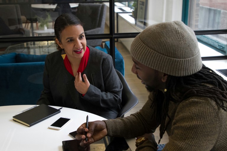 An expat receiving a job offer in the Netherlands.