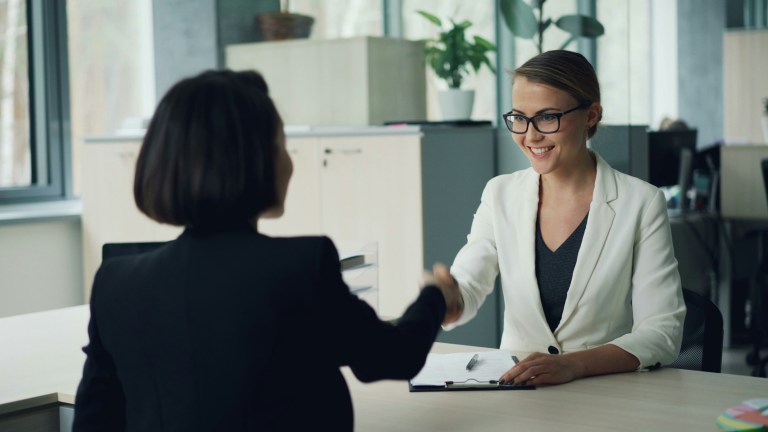 Recruiter reviewing contract during what is employer of record consultation