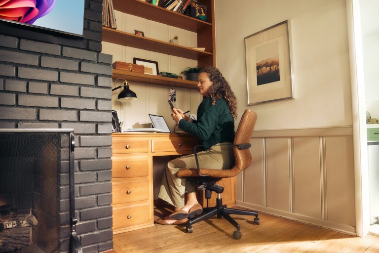 Professional working from a home office in Amsterdam, illustrating remote jobs Netherlands setups.